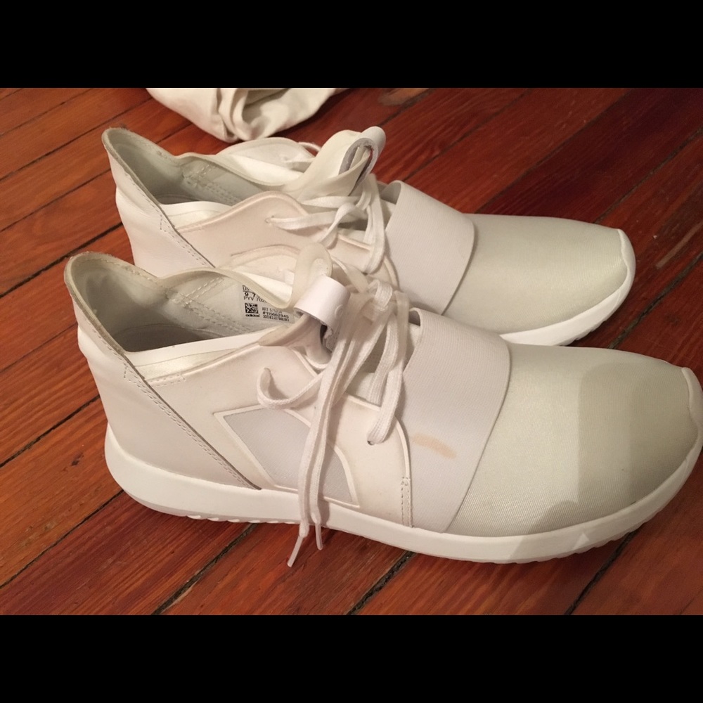 White adidas tubular tennis shoes